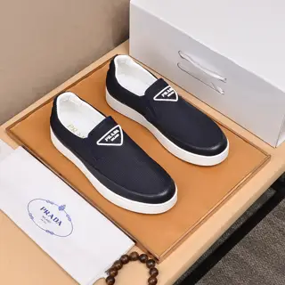 Prada Italian men’s shoes are featured on the cover of the quarterly fashion magazine