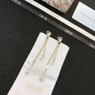 DIOR earrings. Same brass material as the counter. Best seller. Unique design. Retro and