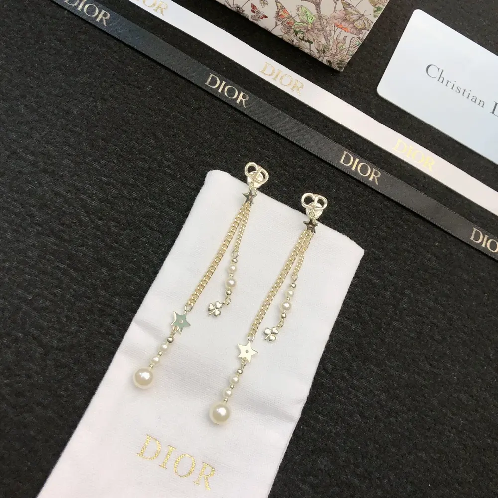 DIOR earrings. Same brass material as the counter. Best seller. Unique design. Retro and