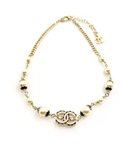 Chanel black pattern white cc necklace