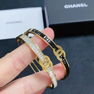 Chanel Double C hollow bracelet with black and white diamonds