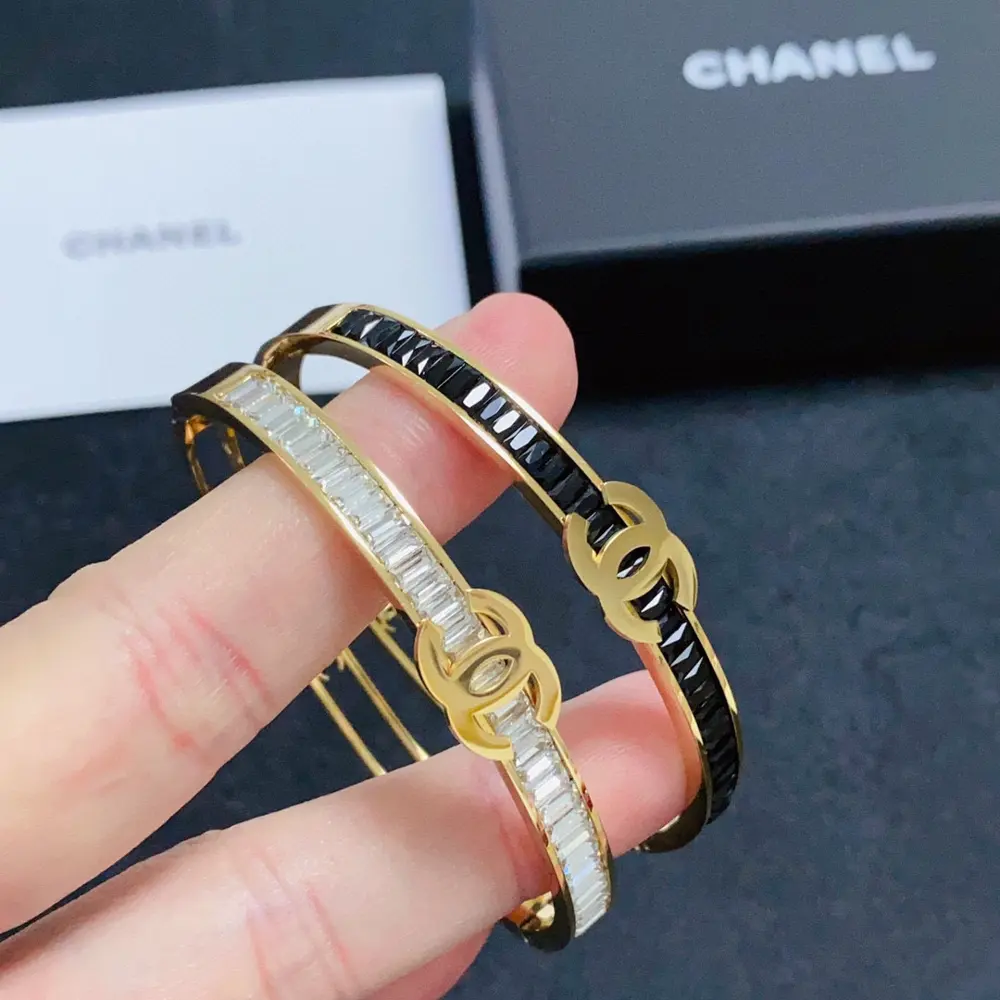Chanel Double C hollow bracelet with black and white diamonds