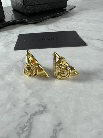 Prada flower triangle earrings