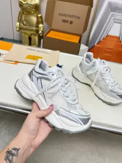 Louis Vuitton Run 55 sneakers combine mesh fabric