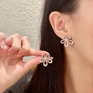 Van Cleef & Arpels diamond-set four-leaf clover earrings