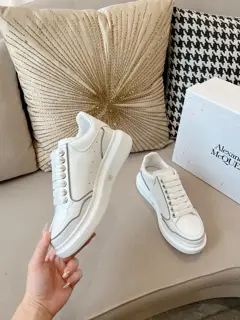 Alexander McQueen classic white shoes with patchwork reflective edging