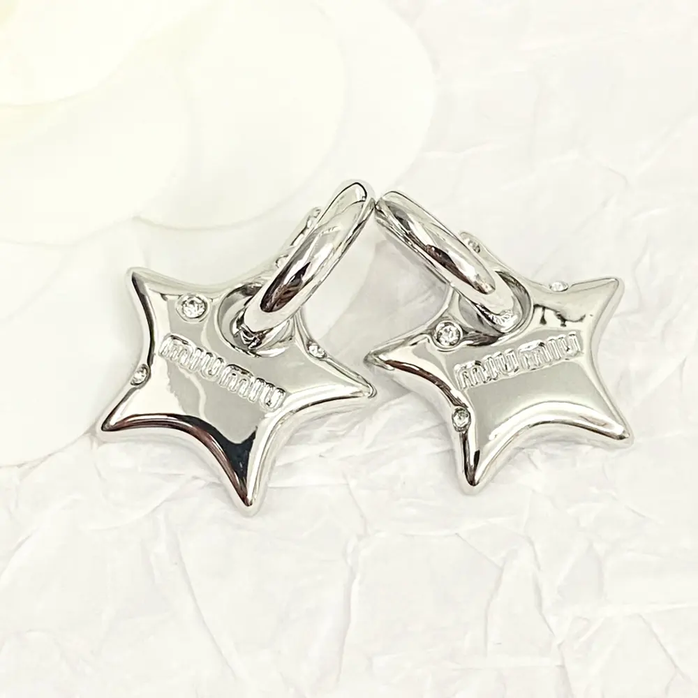 miumiu three-dimensional five-pointed star earrings