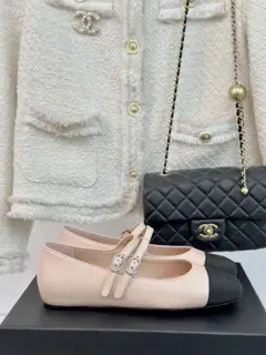 Chanel’s timeless classic color-blocked double-strap Mary Jane shoes