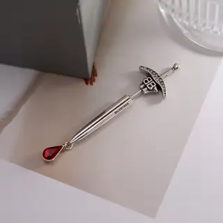 Balenciaga sword earrings