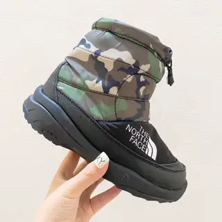 The North Face high-top children’s snow boots