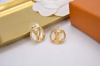 Louis Vuitton white shell earrings with lettering