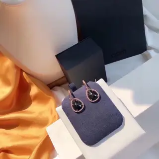 Apm monaco rose gold and black mother-of-pearl earrings