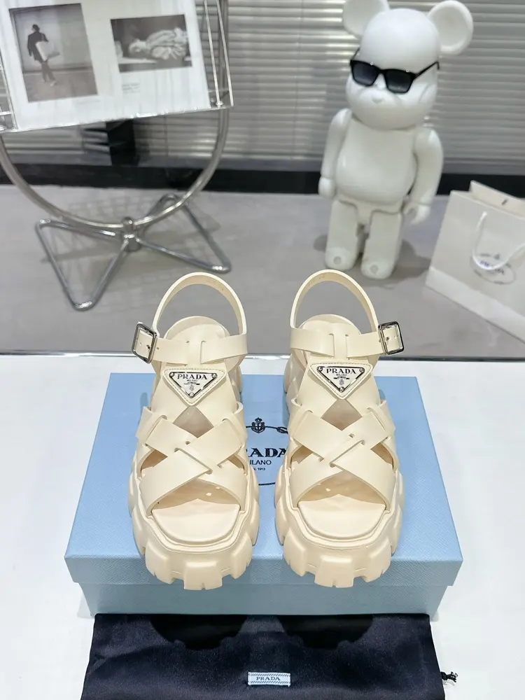 Prada Triangle Buckle Sawtooth Roman Braided Thick-soled Rubber Sandals Retro