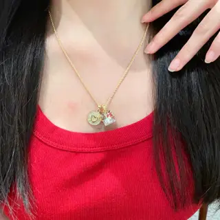 Miumiu necklace is hand-inlaid with diamonds and hearts