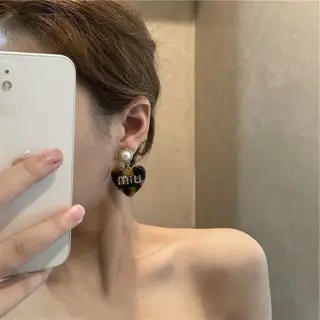 Miumiu’s popular heart earrings