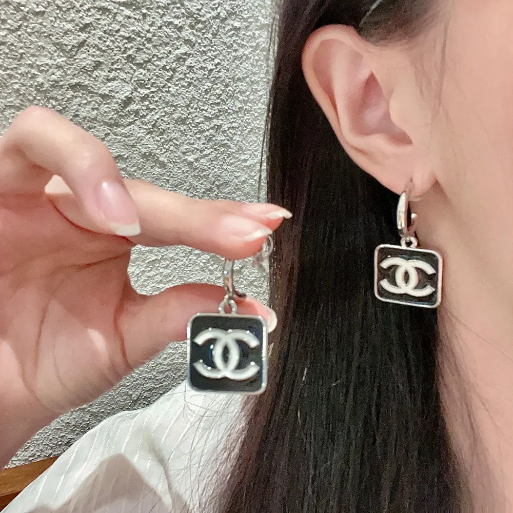 Chanel vintage letter earrings