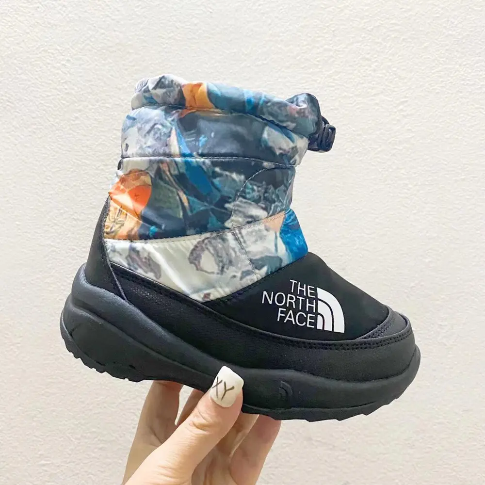 The North Face high-top kids snow boots