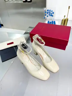 Valentino’s new patent leather version of the classic V-buckle sandals. New and upgraded
