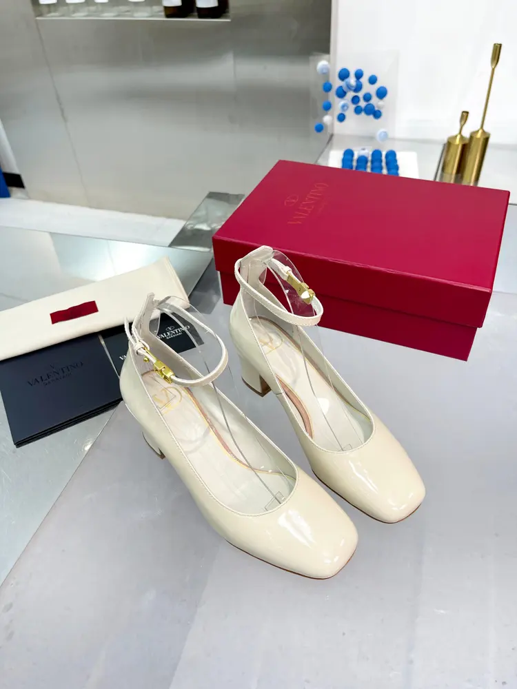 Valentino’s new patent leather version of the classic V-buckle sandals. New and upgraded