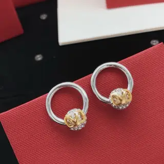 Valentino round earrings with diamonds