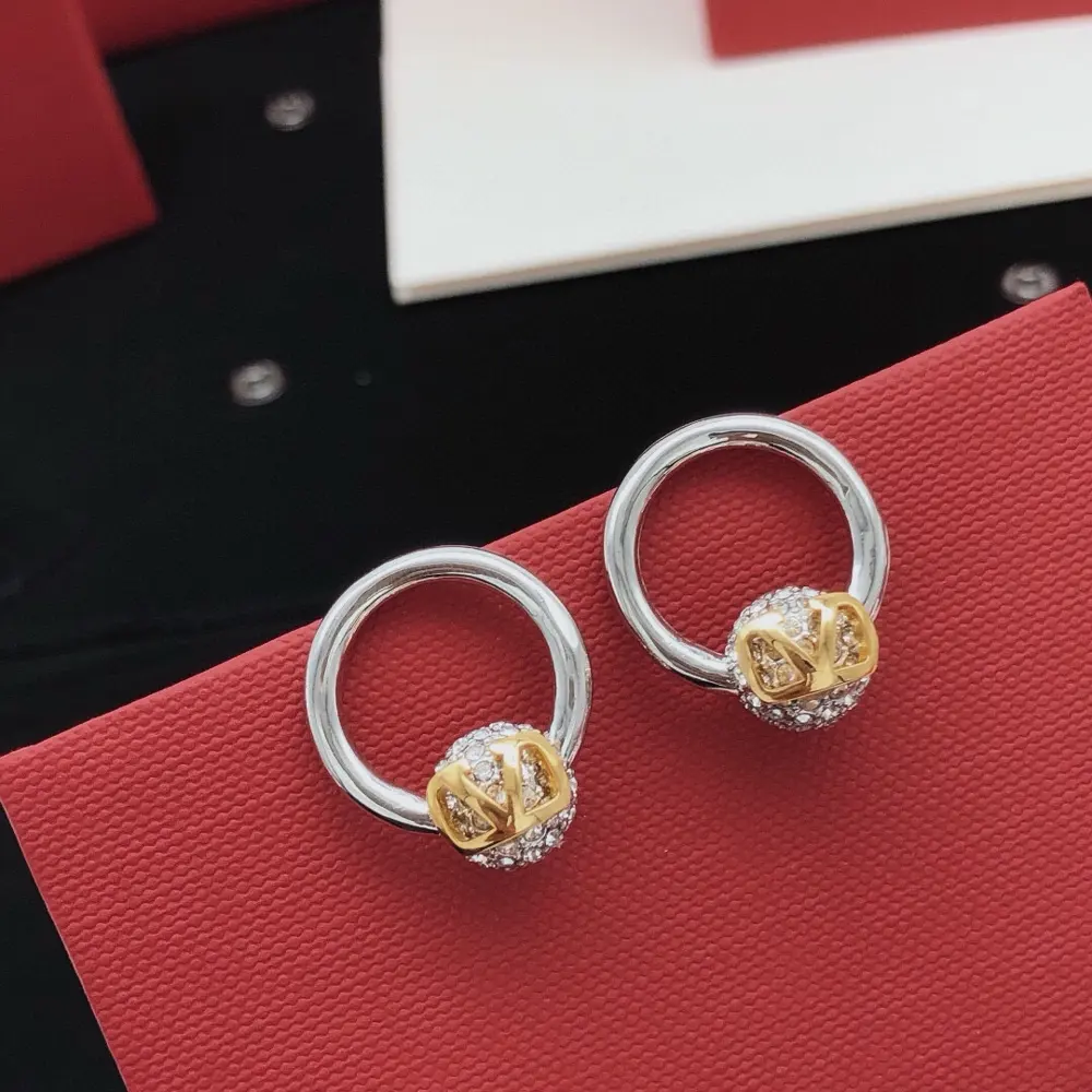 Valentino round earrings with diamonds