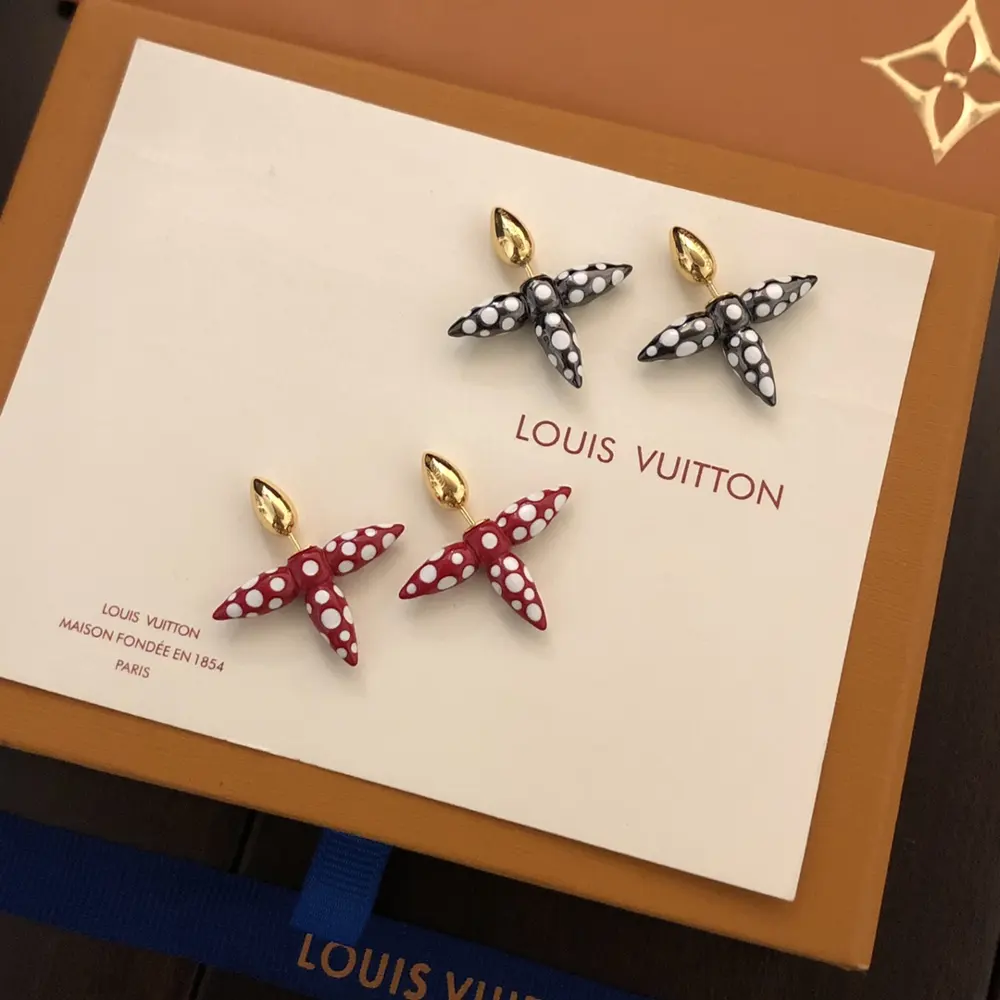 Louis Vuitton cross earrings