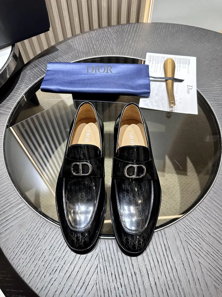 The Dior Granville loafer is a modern take on the dress shoe. Crafted in beige and black