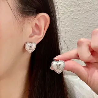 Louis Vuitton vintage letter earrings