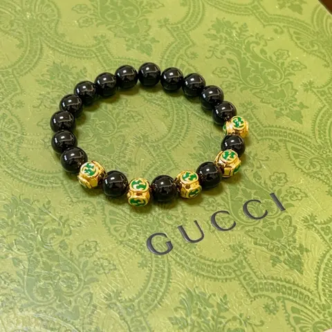 Gucci Luxury bracelets for men and women. The latest black agate beaded bracelet is of a