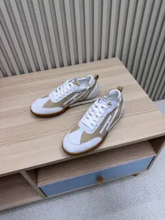 Hermès casual sneakers Suede goatskin sneakers decorated with contrasting patterns and
