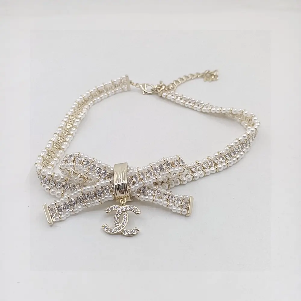 Chanel Heavy Bow Pearl Necklace