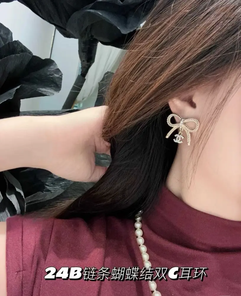 Chanel butterfly earrings with chain
