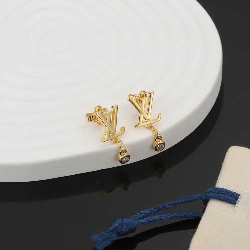 Louis Vuitton letter earrings