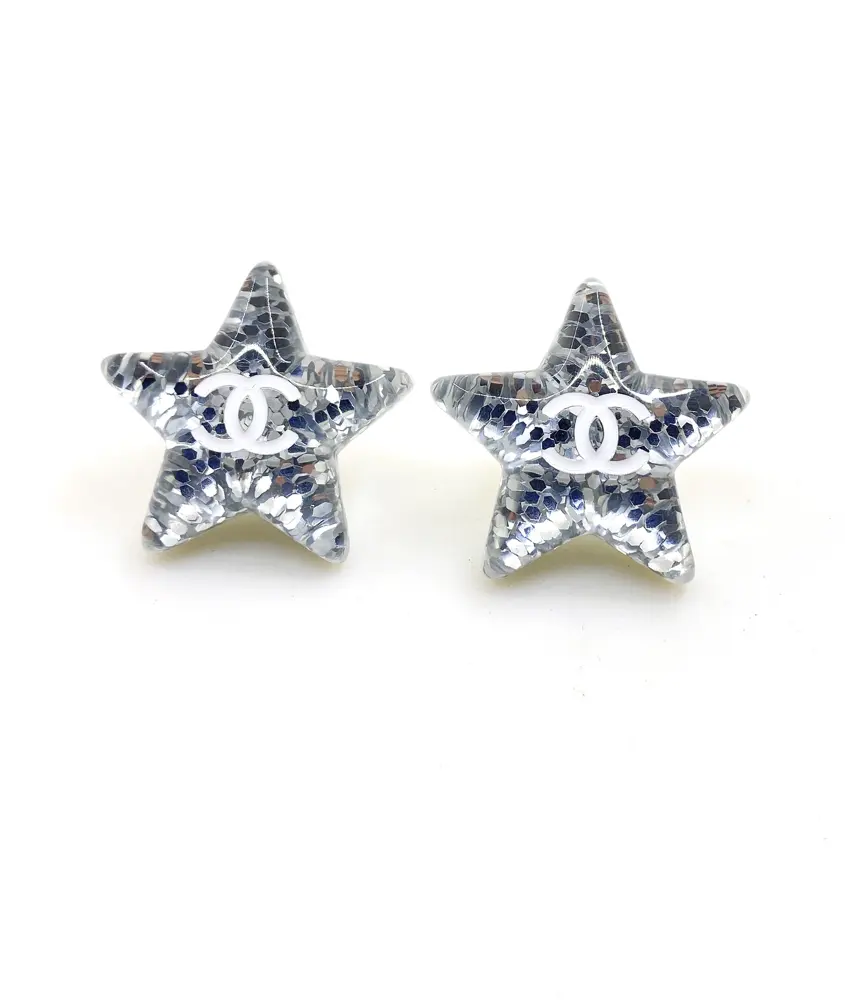 Chanel resin white five-pointed star earrings