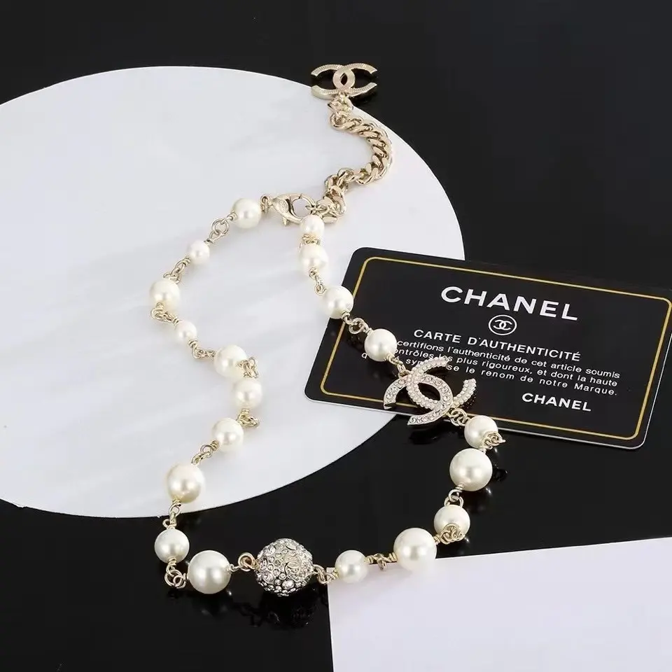 Chanel alphabet pearl necklace sweater chain