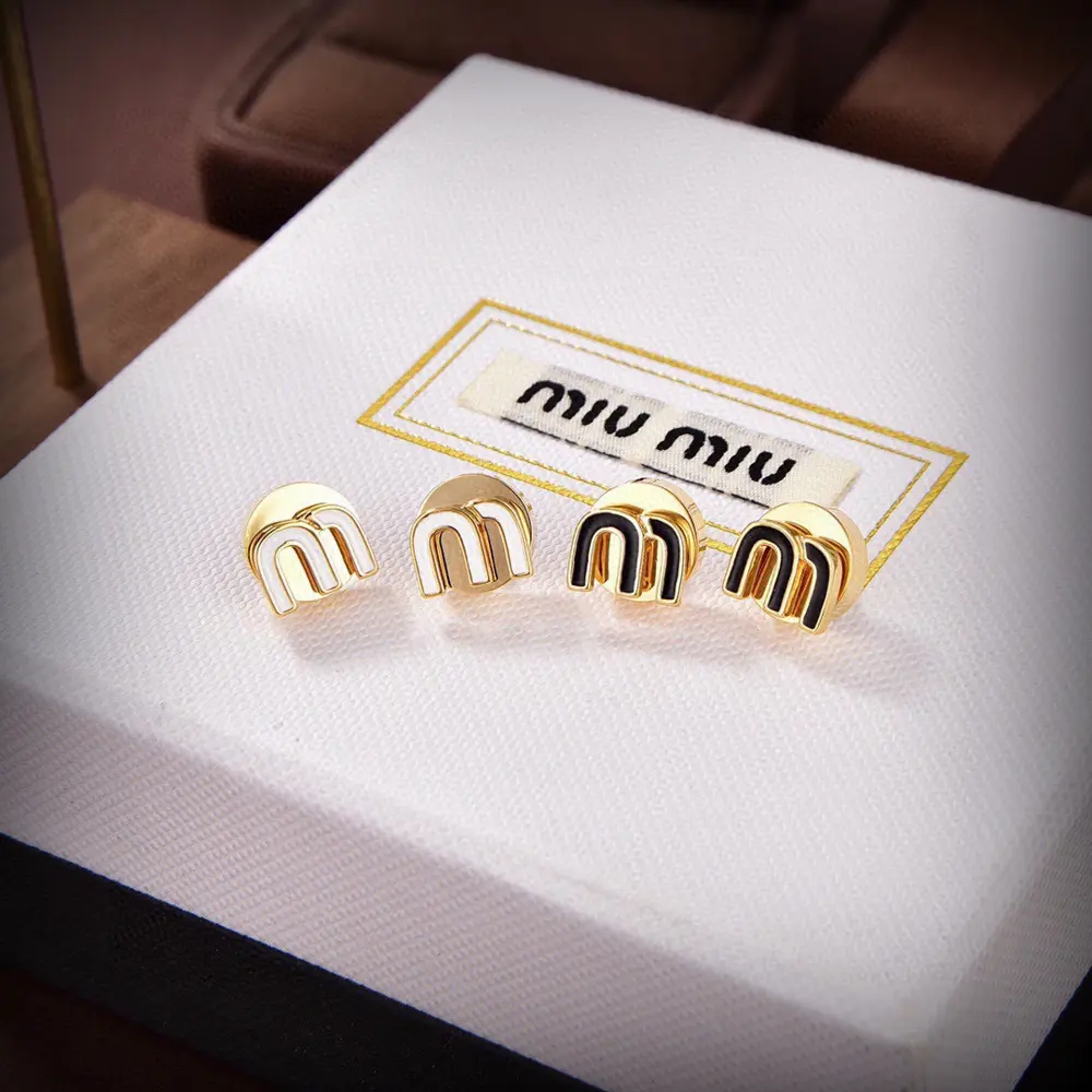 miumiu letter m earrings