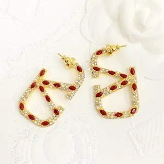 Valentino 3D hollow letter V rhinestone earrings