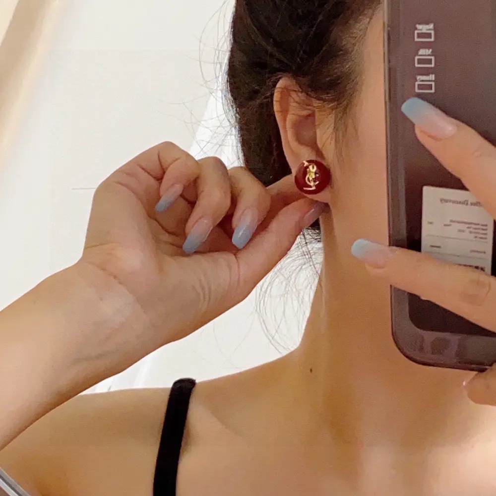 Yves Saint Laurent New Year red earrings