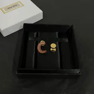 miumiu cowhide earrings