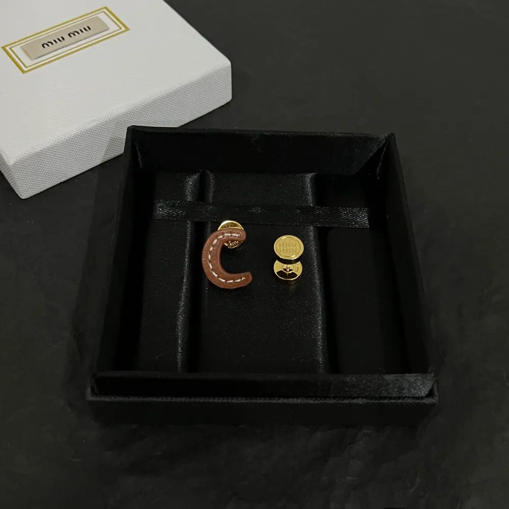 miumiu cowhide earrings