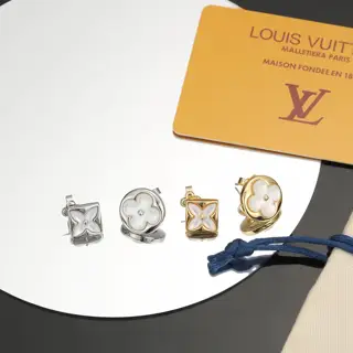 Louis Vuitton asymmetrical four-leaf clover earrings