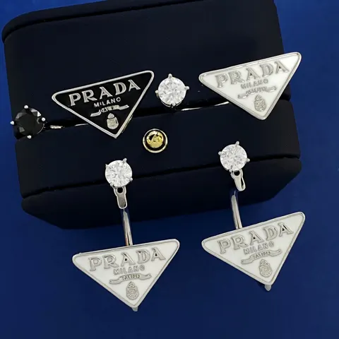 PRADA diamond-studded black and white dripping inverted triangle letter logo