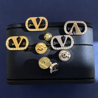 Valentino diamond-studded V earrings