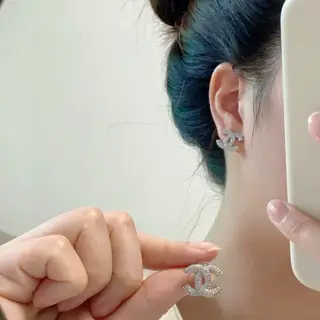 Chanel small earrings inlaid with diamonds