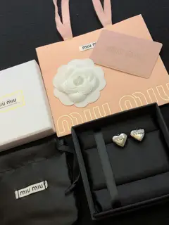 miumiu big heart earrings
