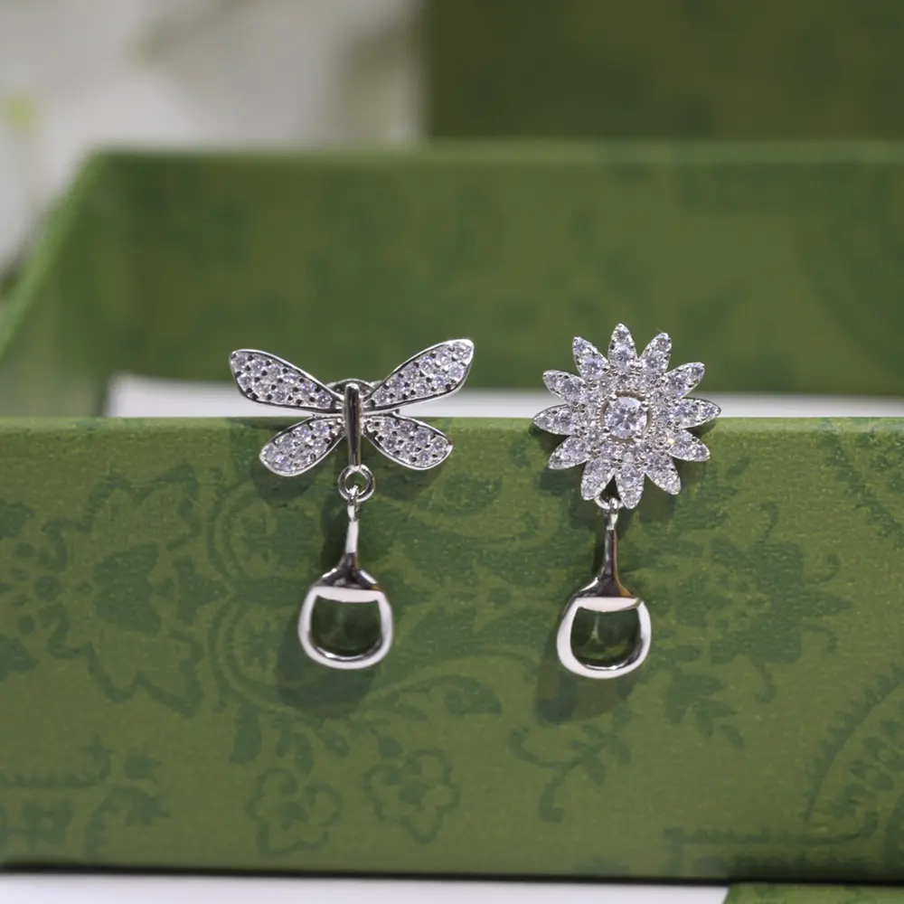 Gucci new daisy butterfly earrings