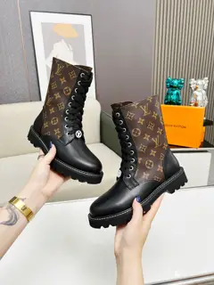 Louis Vuitton Territory mid-calf boots are a combination of smooth cowhide and Monogram