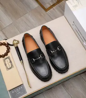 Gucci metal buckle loafers