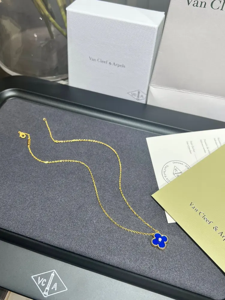 Van Cleef & Arpels Christmas limited edition single diamond blue ceramic four-leaf clover