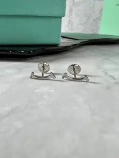 Tiffany smiley face diamond earrings